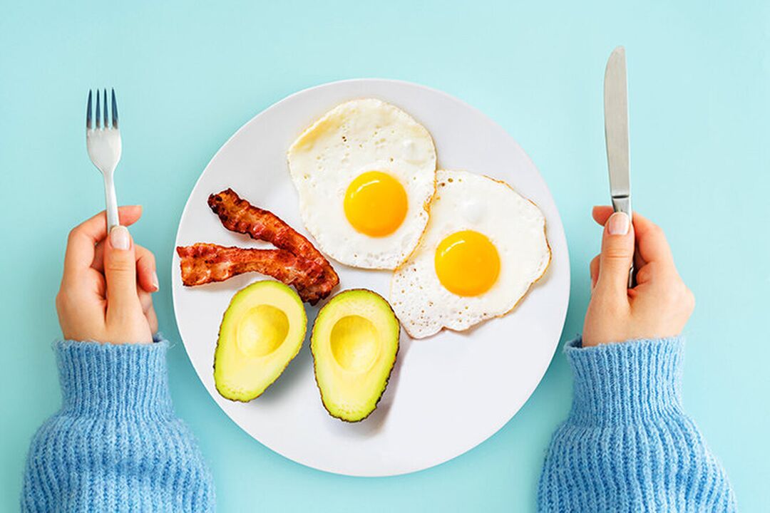 The perfect keto breakfast - eggs with bacon and avocado